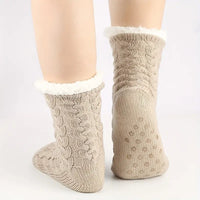 Back view of beige Shapify slipper socks showing the heel and fleece cuff